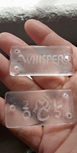 whisper glass in hand