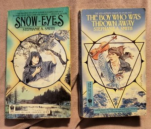 Book covers. 'Snow Eyes' has a dark-haired young woman reaching out to a flying owl. 'Boy' has a dark-blond young man with a violin and a flying owl. 