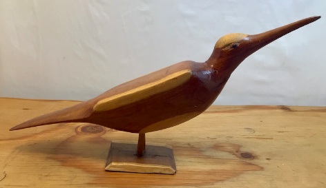 Seller's photo of wood bird sculpture