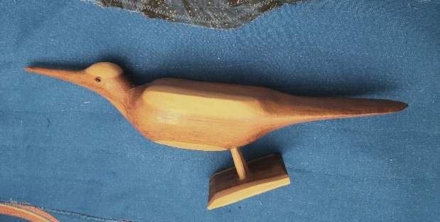 Carved mesquite bird sculpture