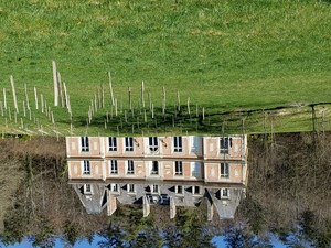 The Chateau in sunlight, from down by the lake 